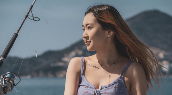 A Bear and a Woman Fishing Together? You Need to See This