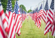 Why These Two Boys Refused to Let a Rainstorm Stop Their Patriotic Duty