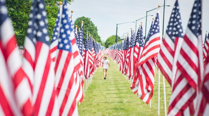 Why These Two Boys Refused to Let a Rainstorm Stop Their Patriotic Duty