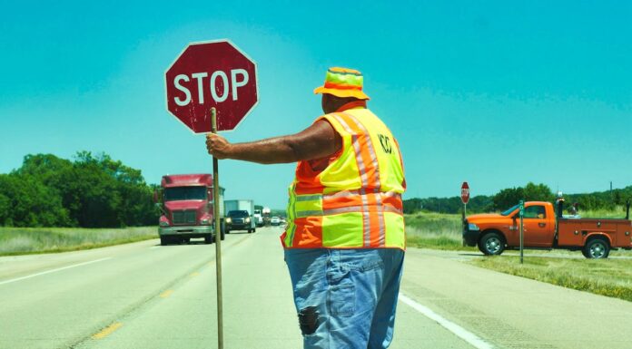 Why Was This Teen Standing in 95°F Heat With a Stop Sign?