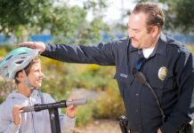 A Cop Babysits a Toddler While Her Dad Faces the Judge