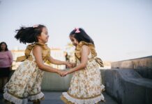 Sisters Perform Cheer Routine, But Their Brother’s Moves Go Viral