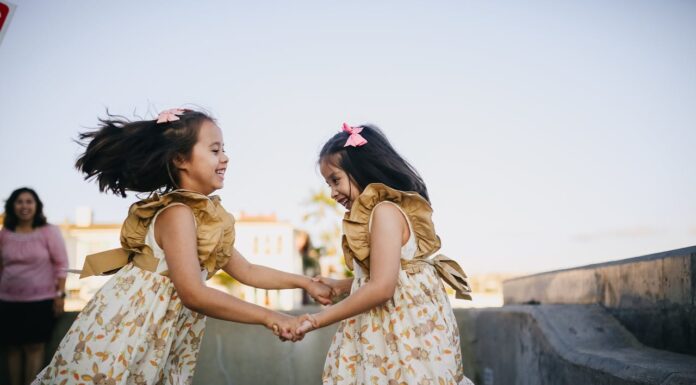 Sisters Perform Cheer Routine, But Their Brother’s Moves Go Viral